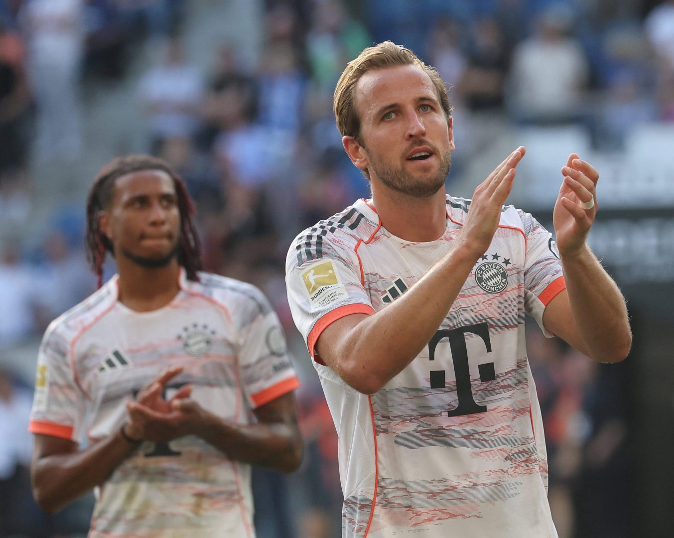 bundesliga roundup: bayern munich secures a win against stuttgart, while wolfsburg climbs to the top by defeating union berlin.