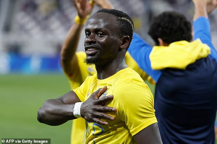 discover cr7's heartfelt gift to mané celebrating senegal's impressive victory, highlighting sportsmanship and unity in football.