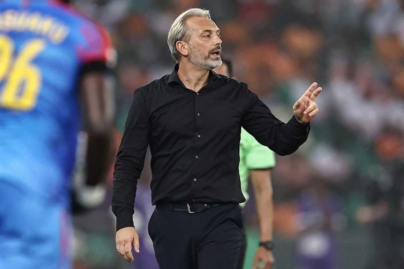 dr congo's desabre gears up for the upcoming clash against algeria, focusing on strategy and team preparation.